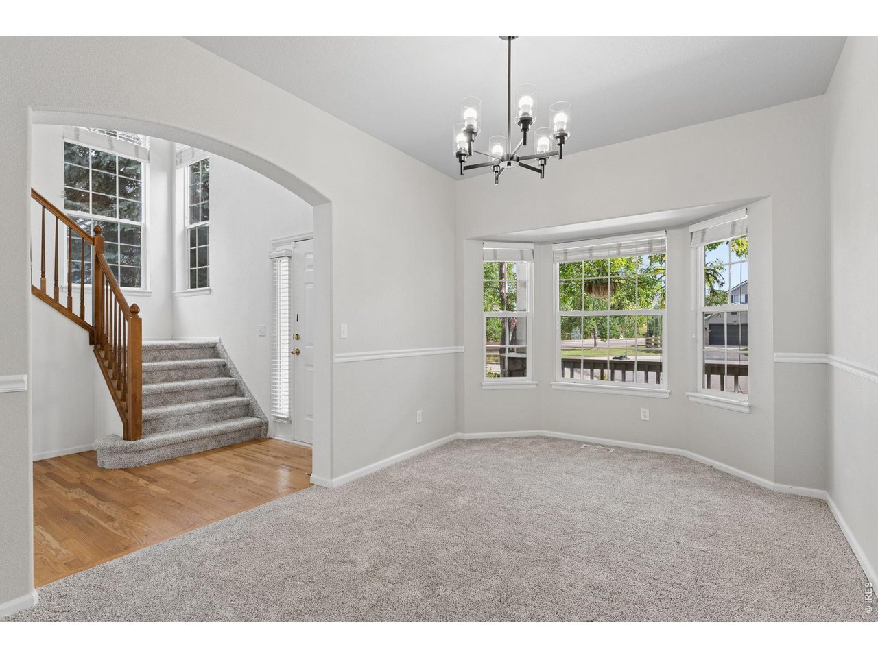 Property Photo 5 Formal Dining Room with Upgraded Bay Window