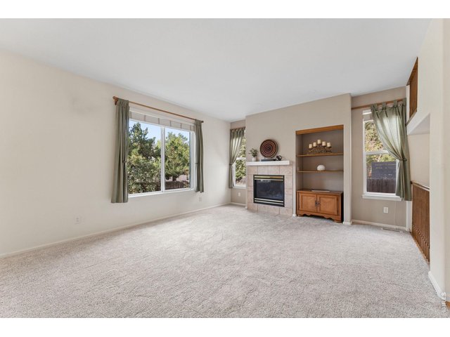 Property Photo 6 UPGRADED Gas Fireplace and Shelving Niche