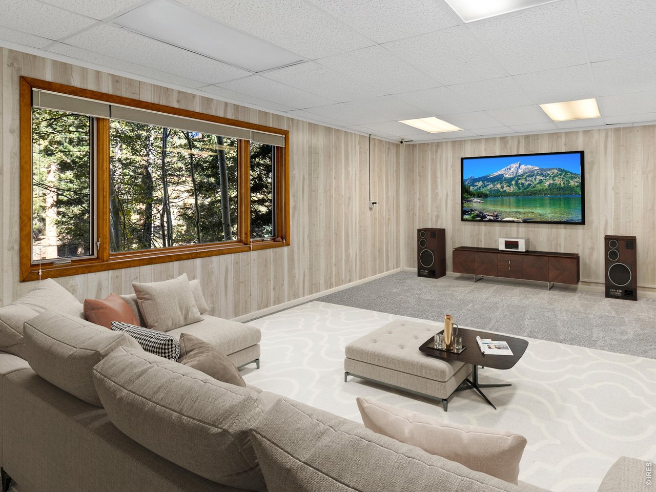 Property Photo 38 Basement virtually staged as a media room