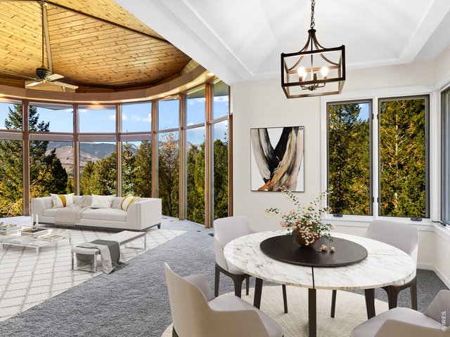 Property Photo 13 virtually staged dining and living areas