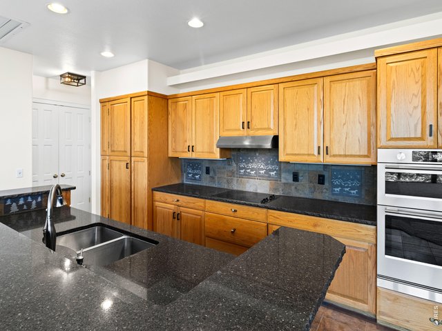 Property Photo 16 Kitchen with electric range and wall oven