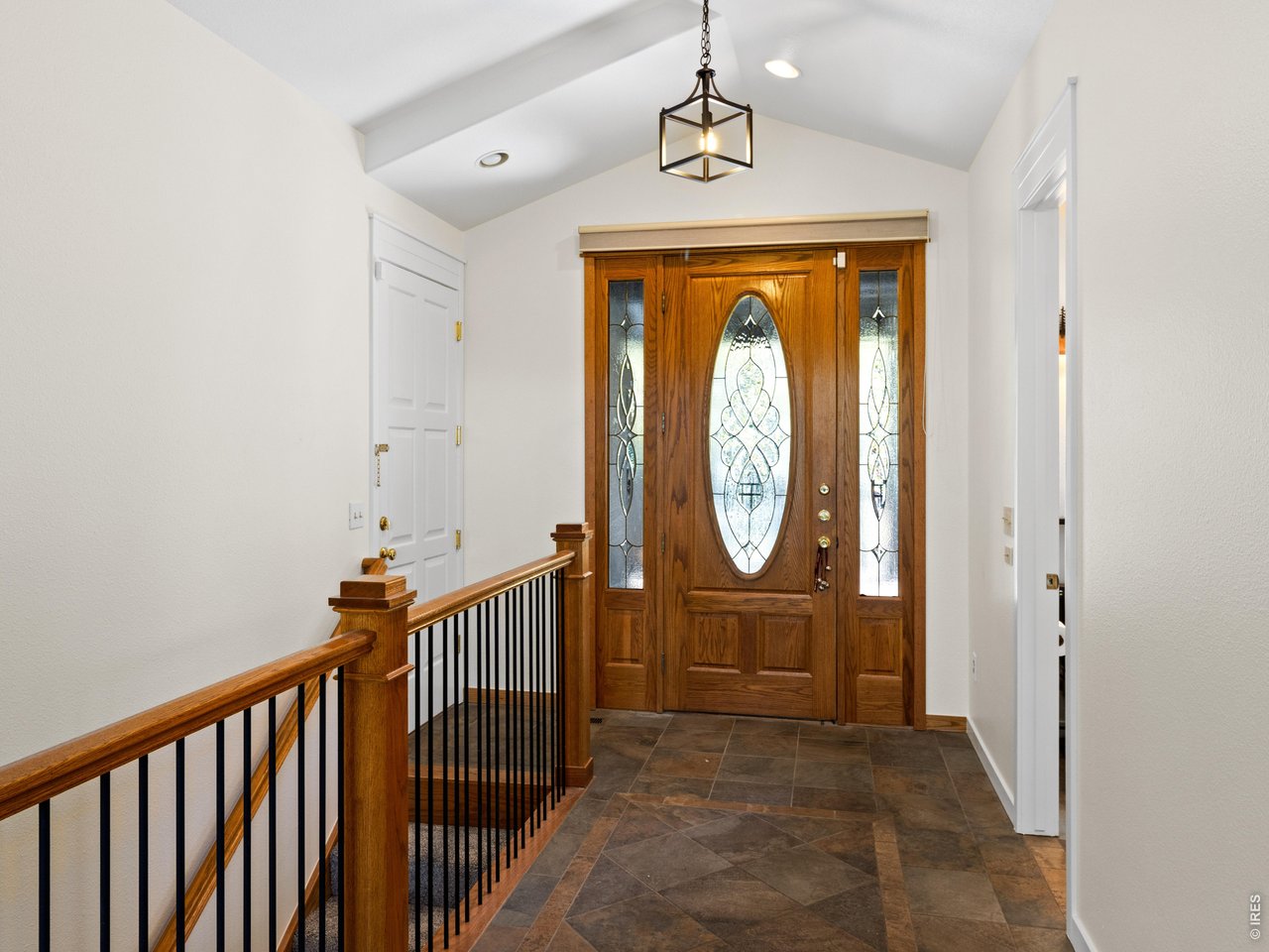 Property Photo 6 Main entry and garage access