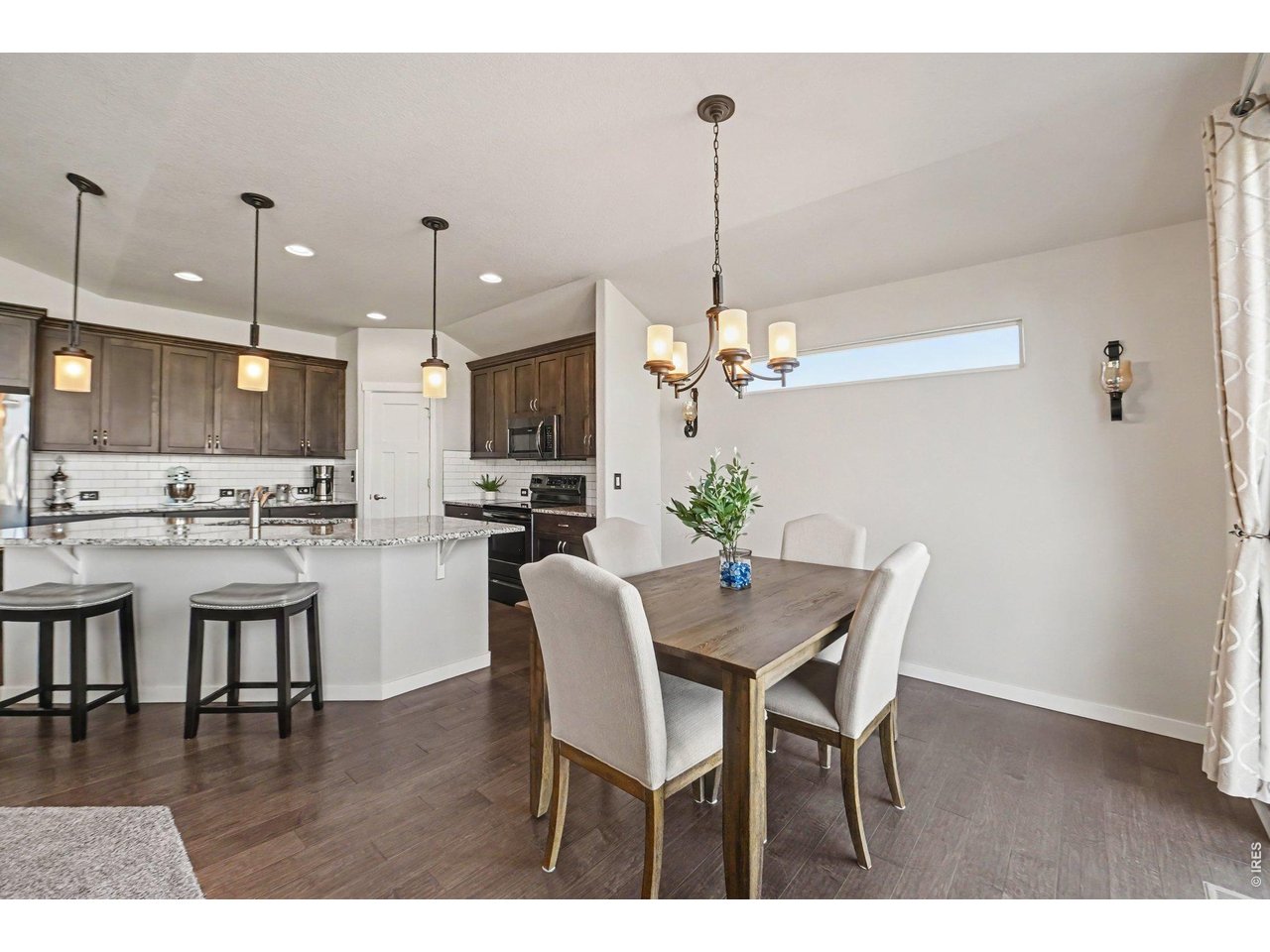 Property Photo 6 Dining area off of kitchen and patio access