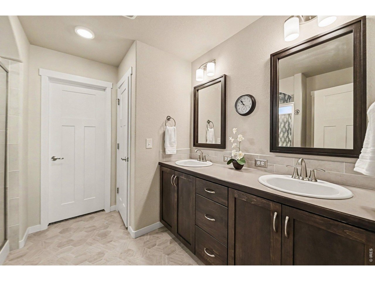 Property Photo 12 Primary bathroom with walk-in closet and separate room with the toilet