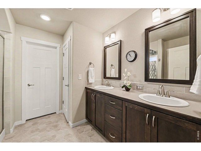 Property Photo 12 Primary bathroom with walk-in closet and separate room with the toilet