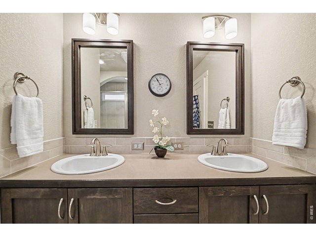 Property Photo 13 Double sinks in primary bathroom