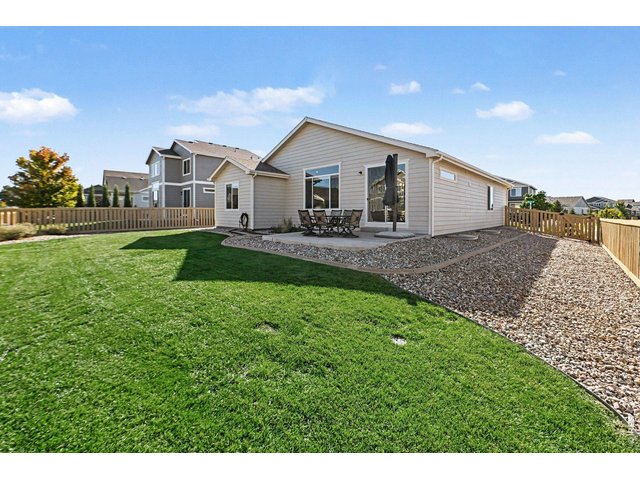 Property Photo 20 Spacious fully fenced backyard with sprinkler system