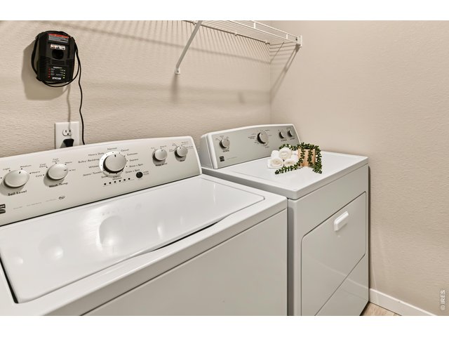 Property Photo 18 Separate laundry room with shelving