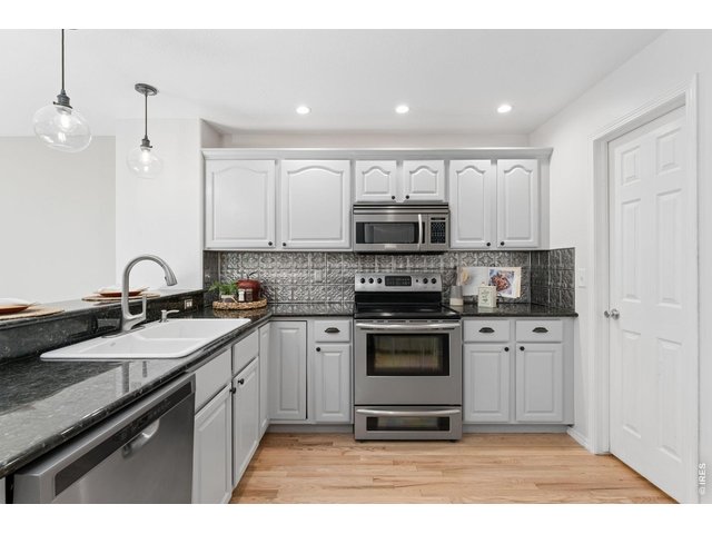 Property Photo 11 Updated Kitchen and Freshly Painted Cabinetry...