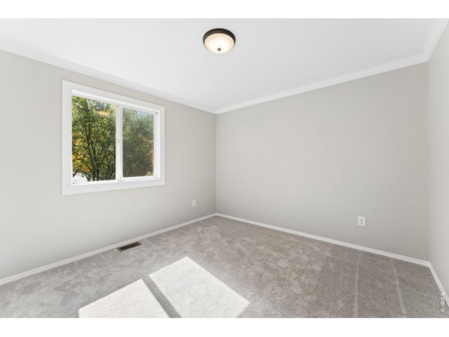 Property Photo 14 Main Level Bedroom / Office with a...