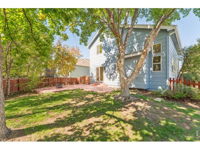 Property Photo 25 HUGE Stamped Concrete Patio and Large Backyard...