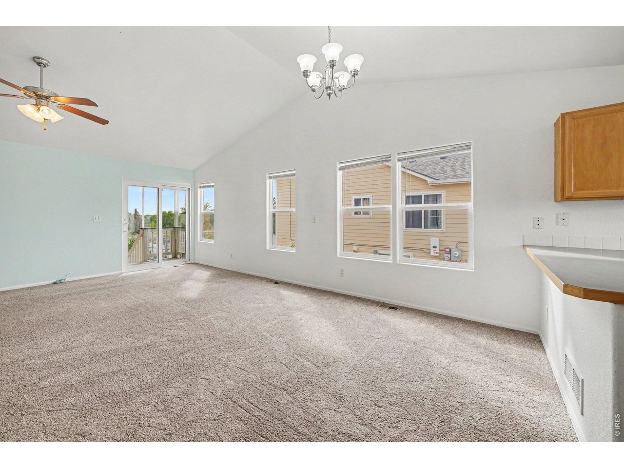 Property Photo 8 Living Space with Sliding Door to Backyard Patio
