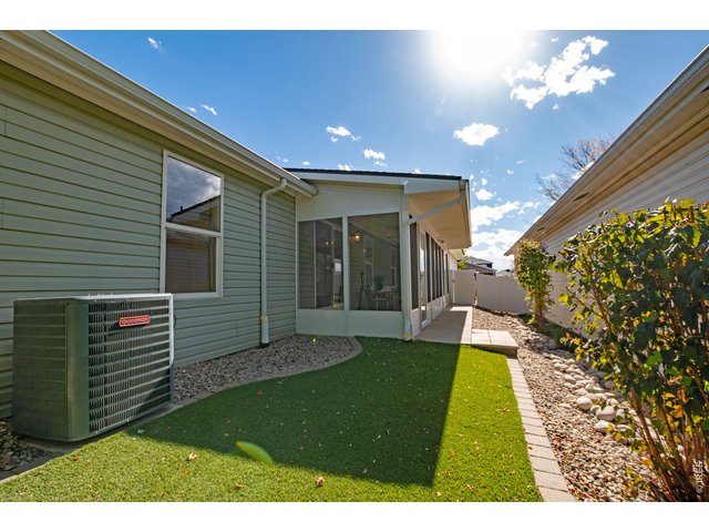 Property Photo 26 Artificial turf for ease and beauty.