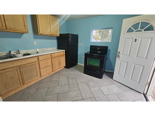 Property Photo 12 Unit D -entry