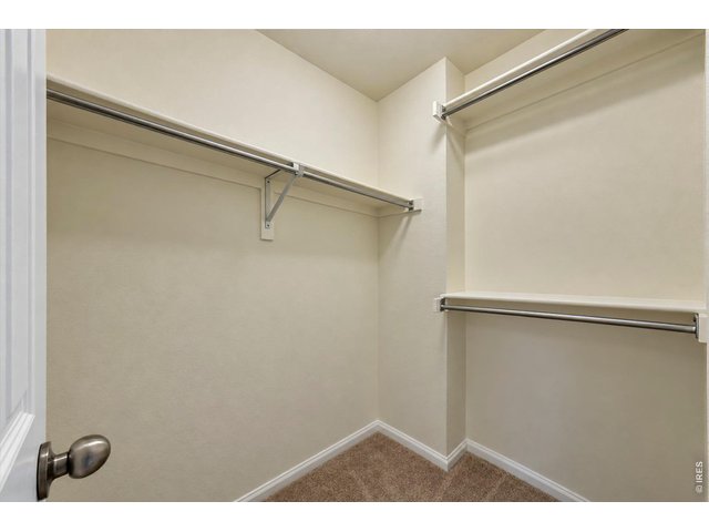 Property Photo 27 Primary Bedroom walk in closet