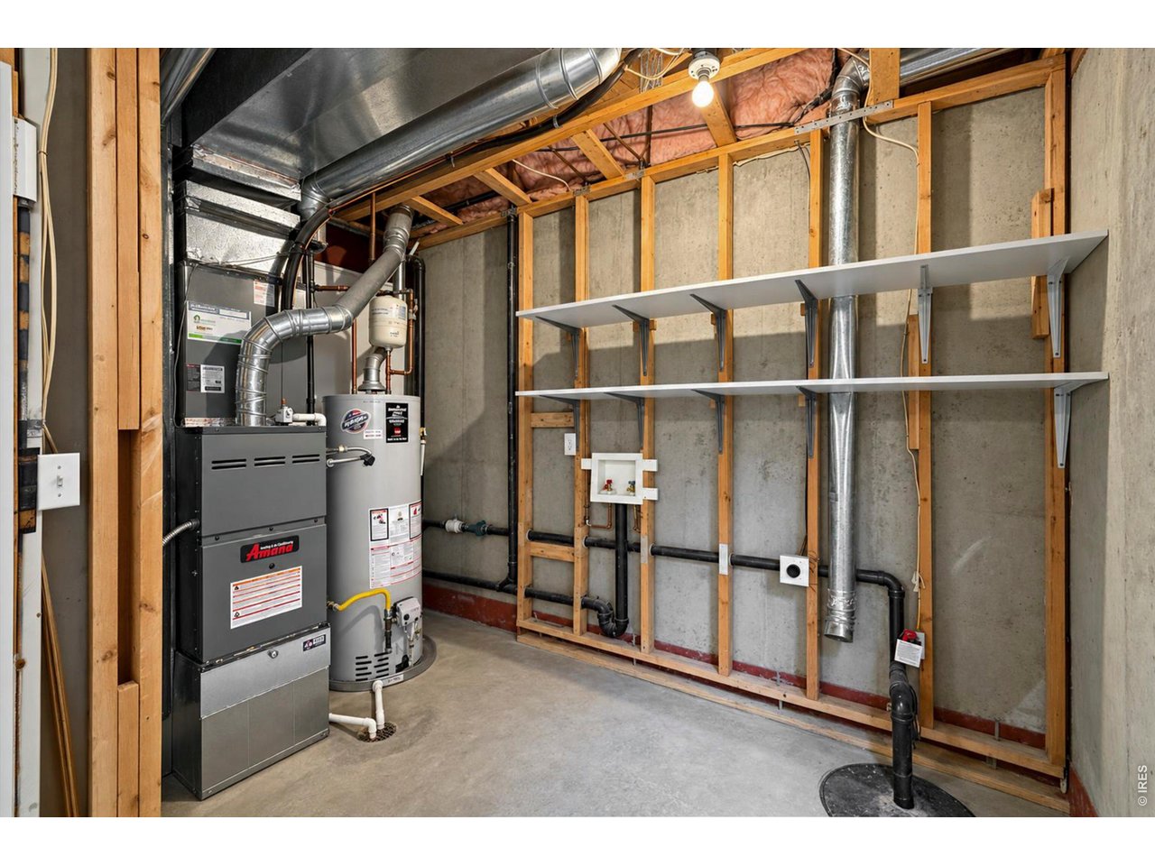 Property Photo 35 Basement level mechanical room and washer/dryer hook ups