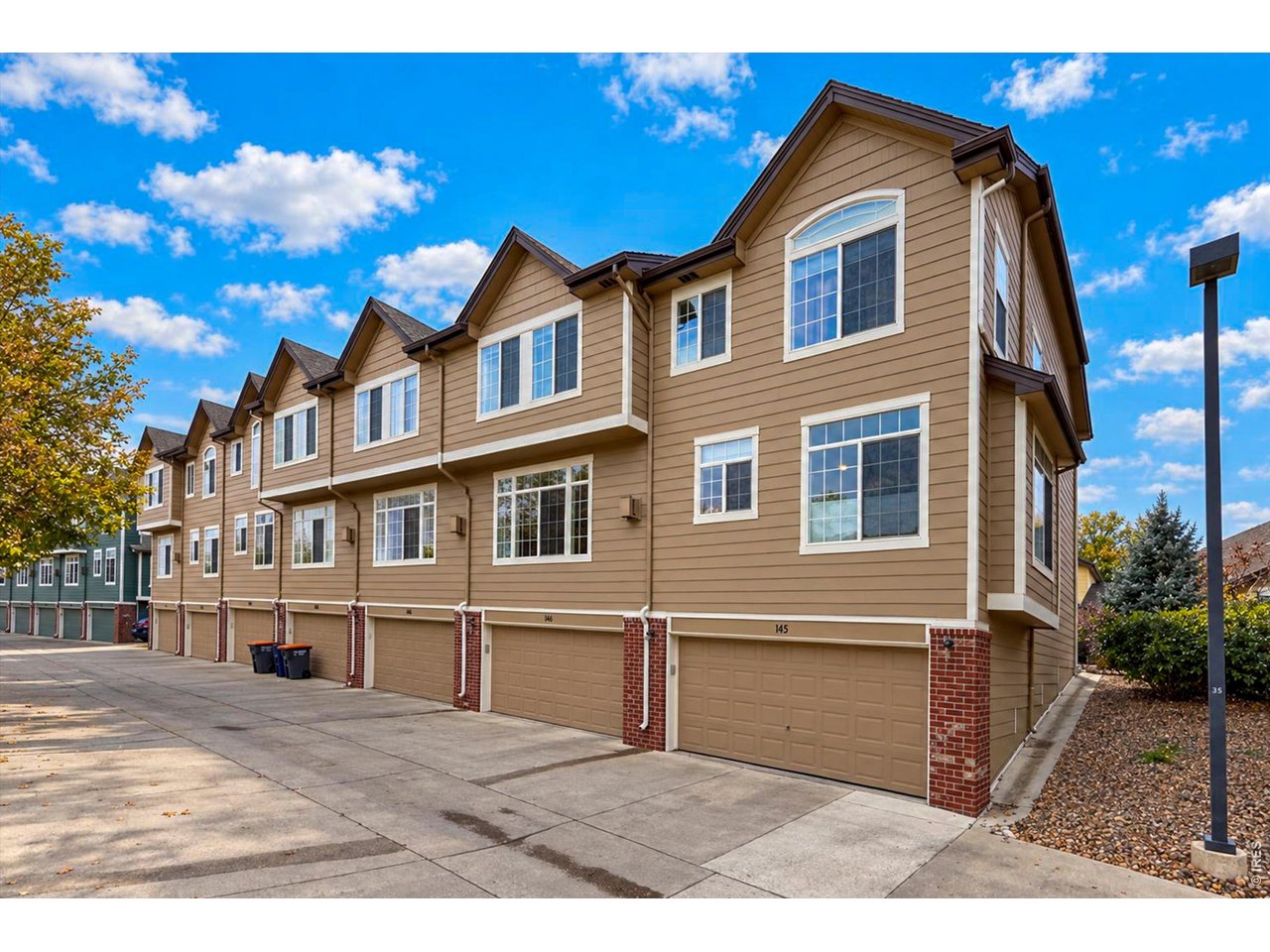 Property Photo 38 townhome style with attached garages