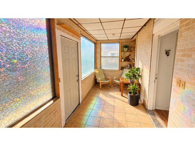 Property Photo 27 Unit B Sun Room