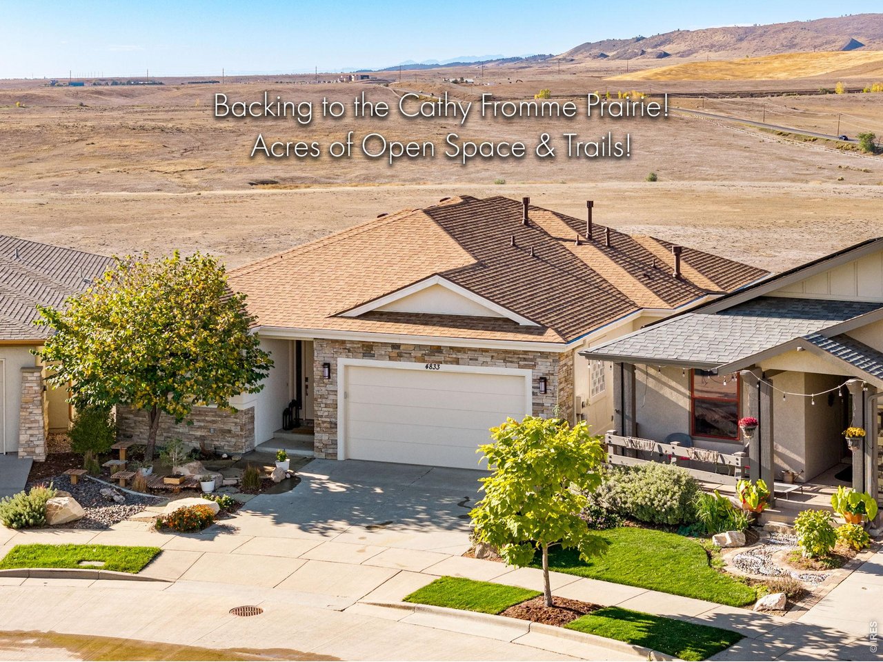 Property Photo 14 Easy luxury living, with a Xeriscaped front yard and drip lines! Insulated and Finished 2 car garage! 50 amp for EV in garage.