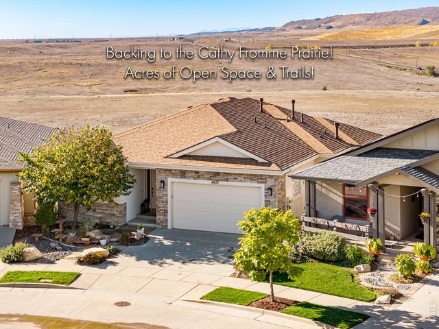 Property Photo 14 Easy luxury living, with a Xeriscaped front yard and drip lines! Insulated and Finished 2 car garage! 50 amp for EV in garage.