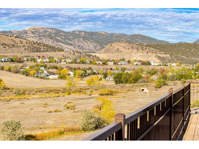 Property Photo 3 The heart of a nature lover soars with trails right outside, the entire Cathy Fromme Prairie & Open Space behind and the trail head just down the street! Curated Modern Design & Feel, Xeriscaped. Exquisitely finished + adorned! 3,783 total SQFT.