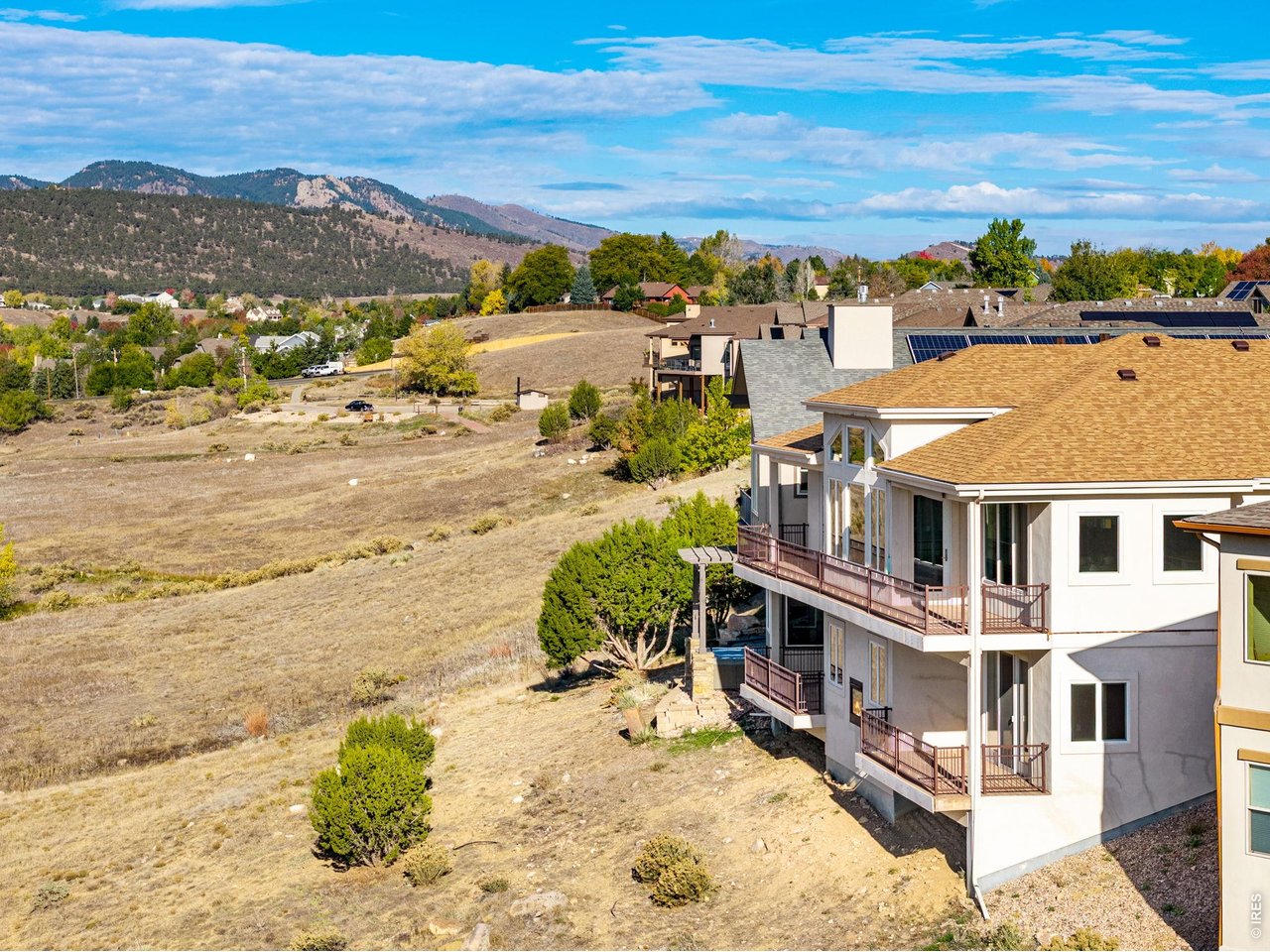Property Photo 9 Backing to the Fossil Creek Trail,  Horsetooth Rock and the Cathy Fromme Prairie - Breathtaking Foothll Rocky Mountain views right off the Deck!!! It just doesn't get any better than this, Hunting for a view? This is the paradise
