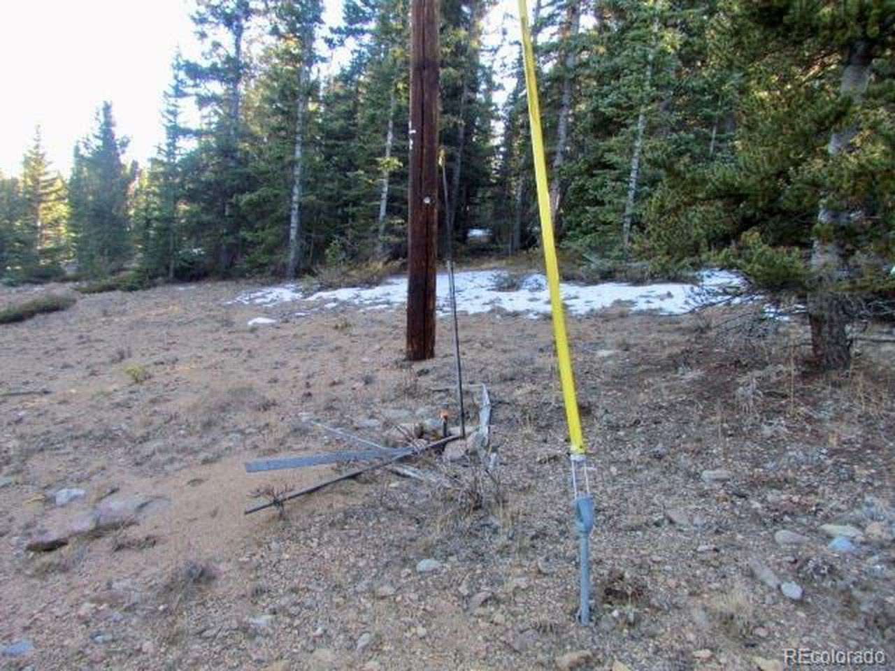 SW corner pin & power pole