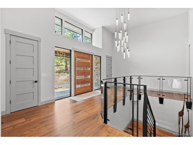 Property Photo 3 The interior is thoughtfully designed with a modern touch, blending clean lines, elevated finishes, and a warm, inviting atmosphere