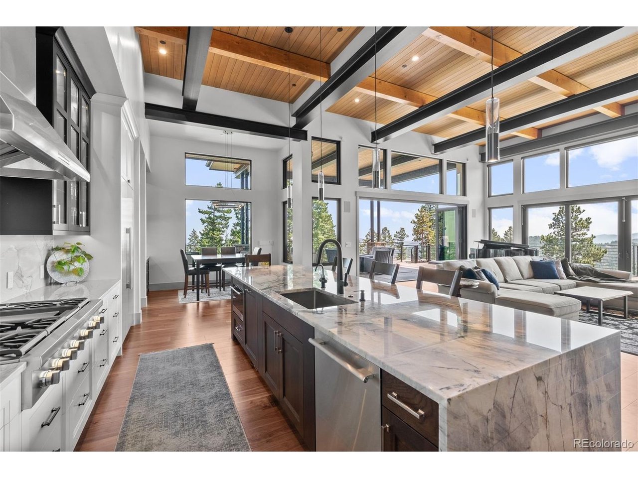 This culinary haven seamlessly connects to the dining area, great room and outdoor living areas, perfect for entertaining