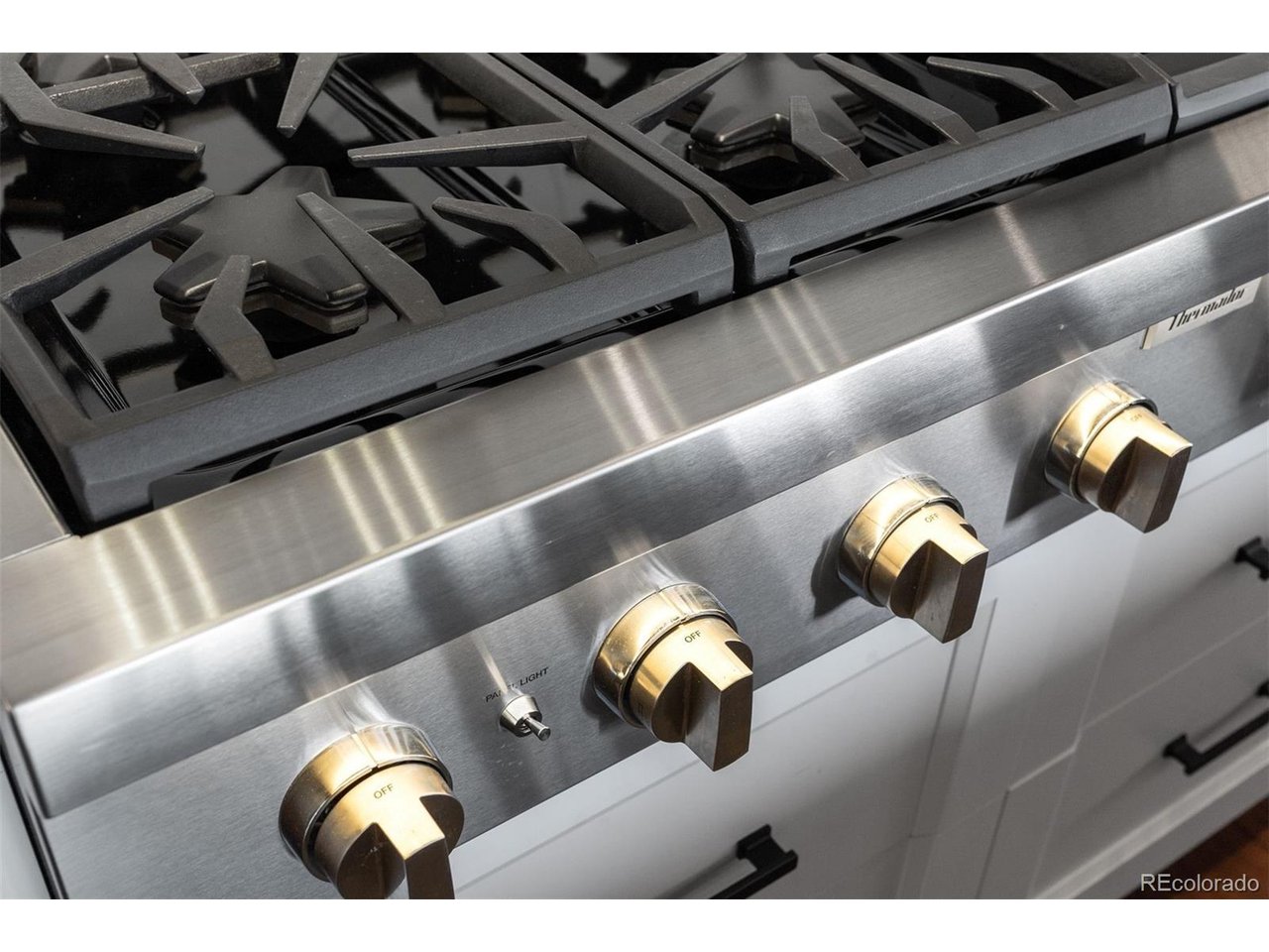 High-end appliances enhance the kitchen with both performance and a refined mountain-modern feel