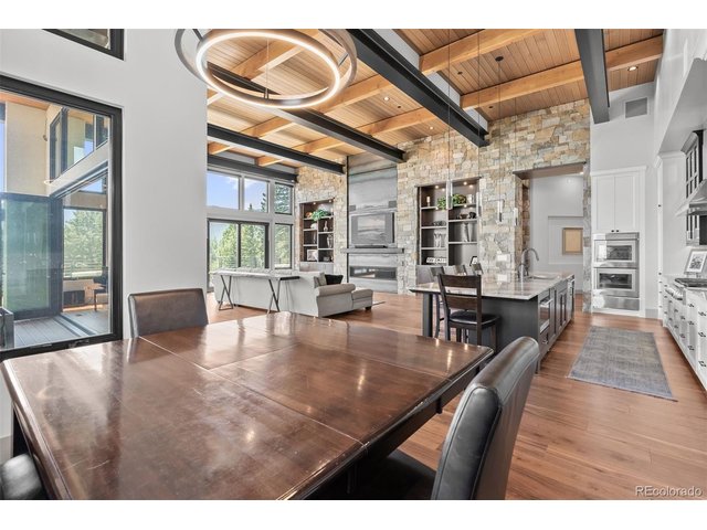 Property Photo 19 An open layout that flows effortlessly into the dining area, creating an inviting atmosphere for culinary creativity and shared meals