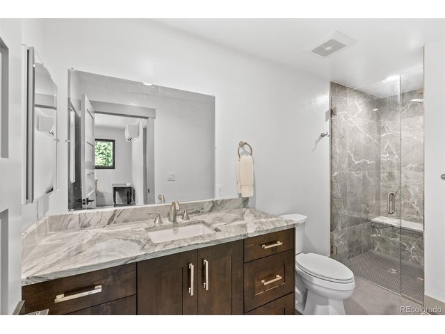 Property Photo 42 This bathroom perfectly balances style and practicality