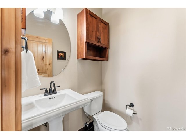 Property Photo 8 Main floor powder bath.