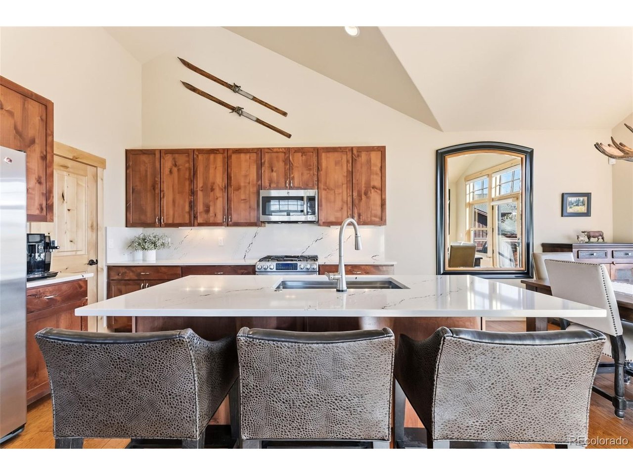 Lots of counter and cabinet space in a flexible kitchen layout.
