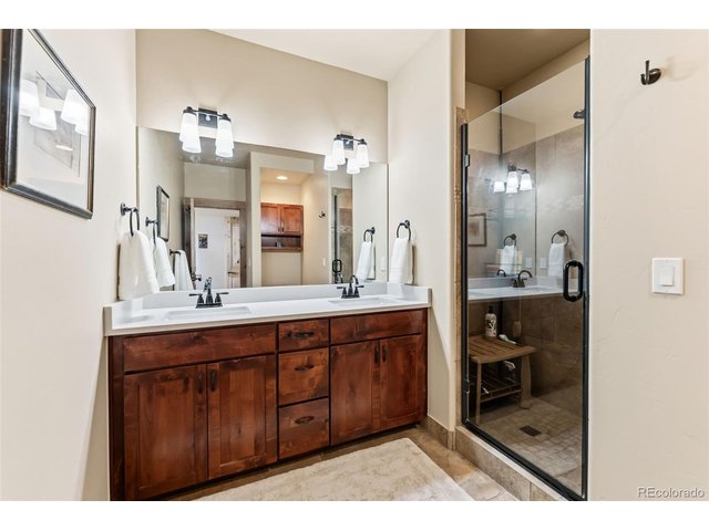 Property Photo 15 Updated en-suite primary bath.