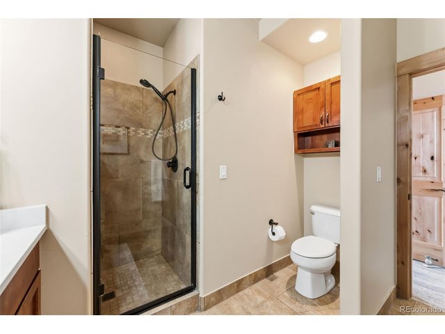 Property Photo 16 Shower in en-suite primary bath.