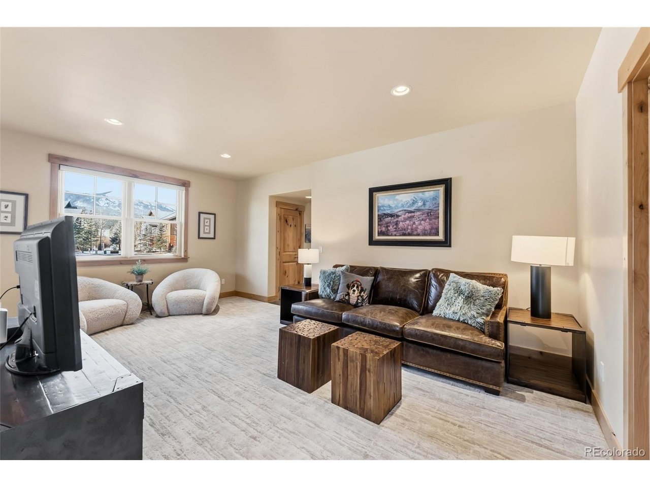 Lower level second living area with plenty of space for multiple uses.