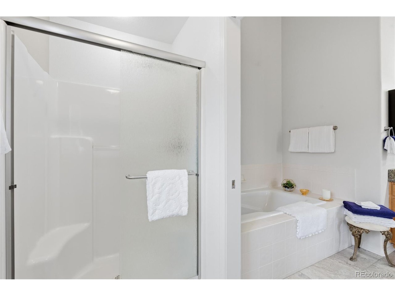 Soaking tub with separate shower