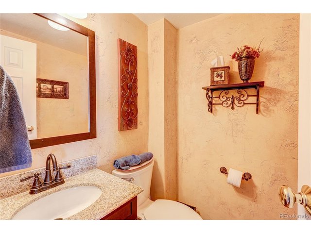 Property Photo 16 Main level half bath for guests. Updated features.
