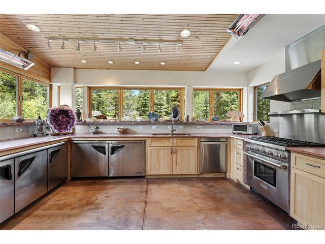 Property Photo 6 Partial Glimpse of the Massive Kitchen