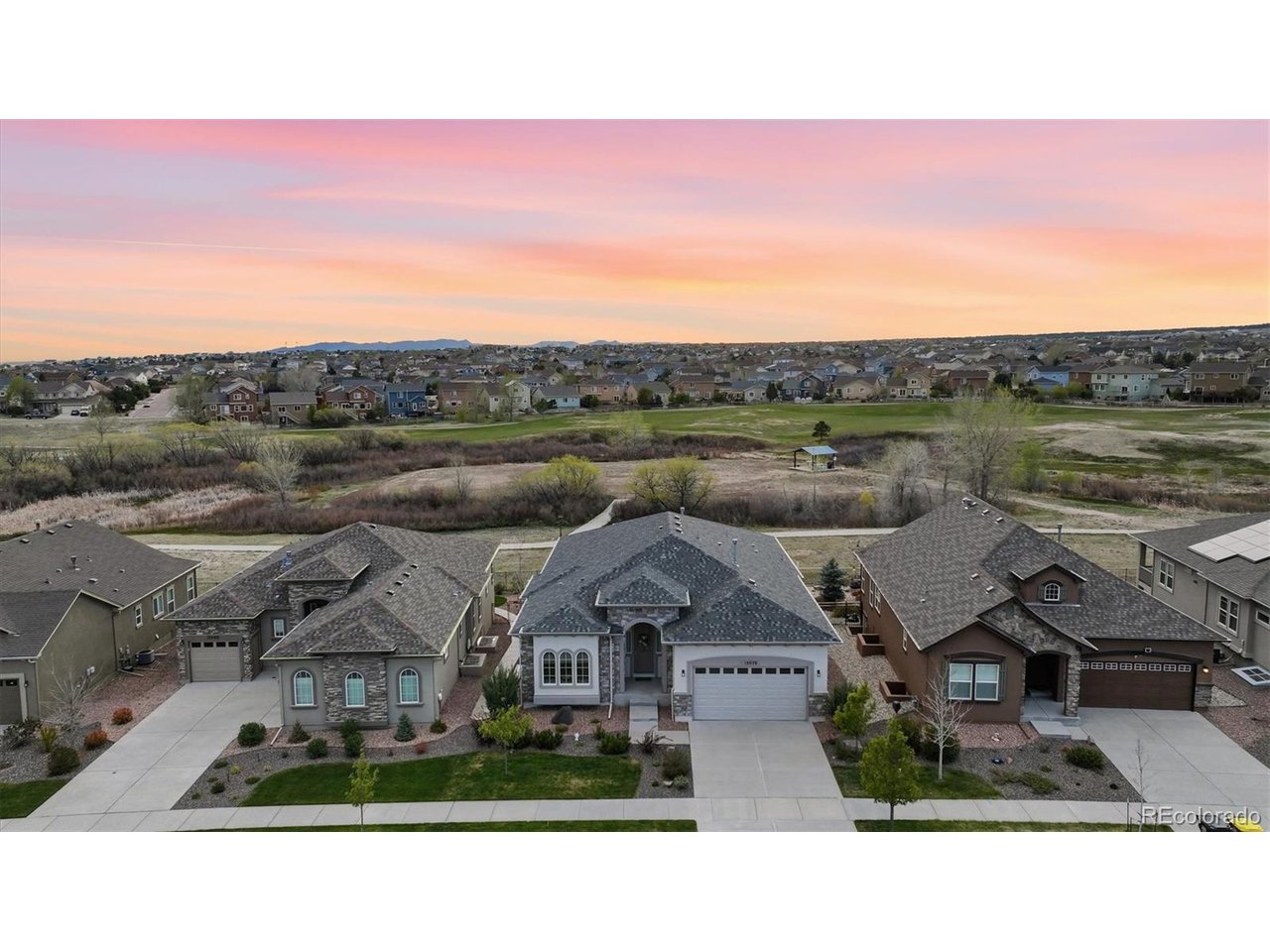 Aerial view of home that backs to walking trails and Stonebridge Park.