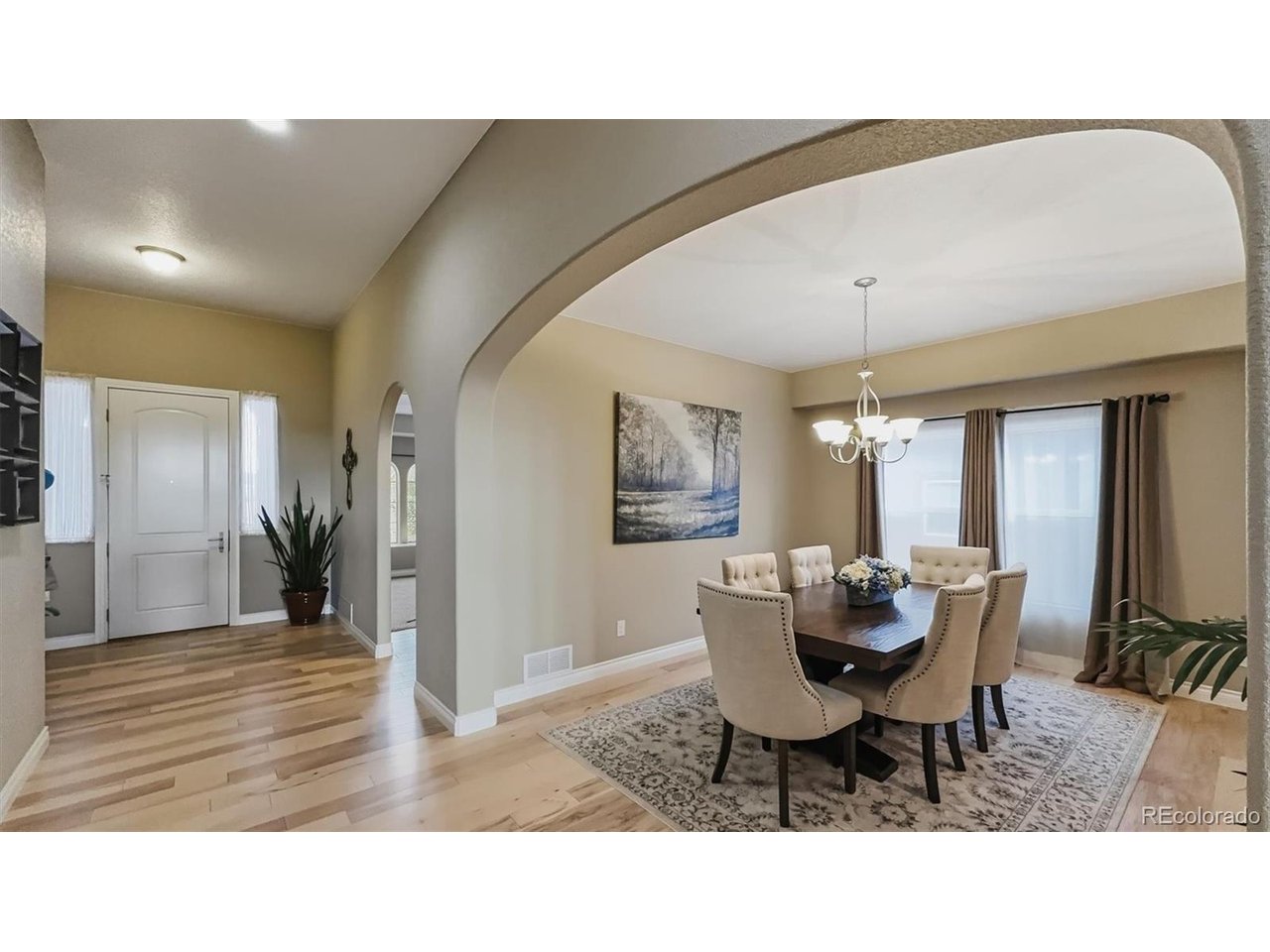 Arched entry into the formal Dining Room, perfect for gatherings.