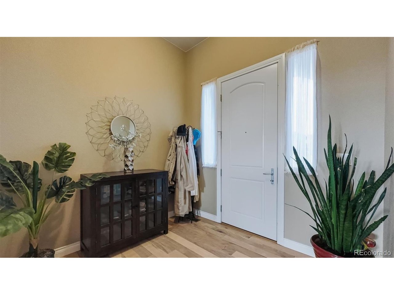 Front Entry with gleaming hardwood floors.