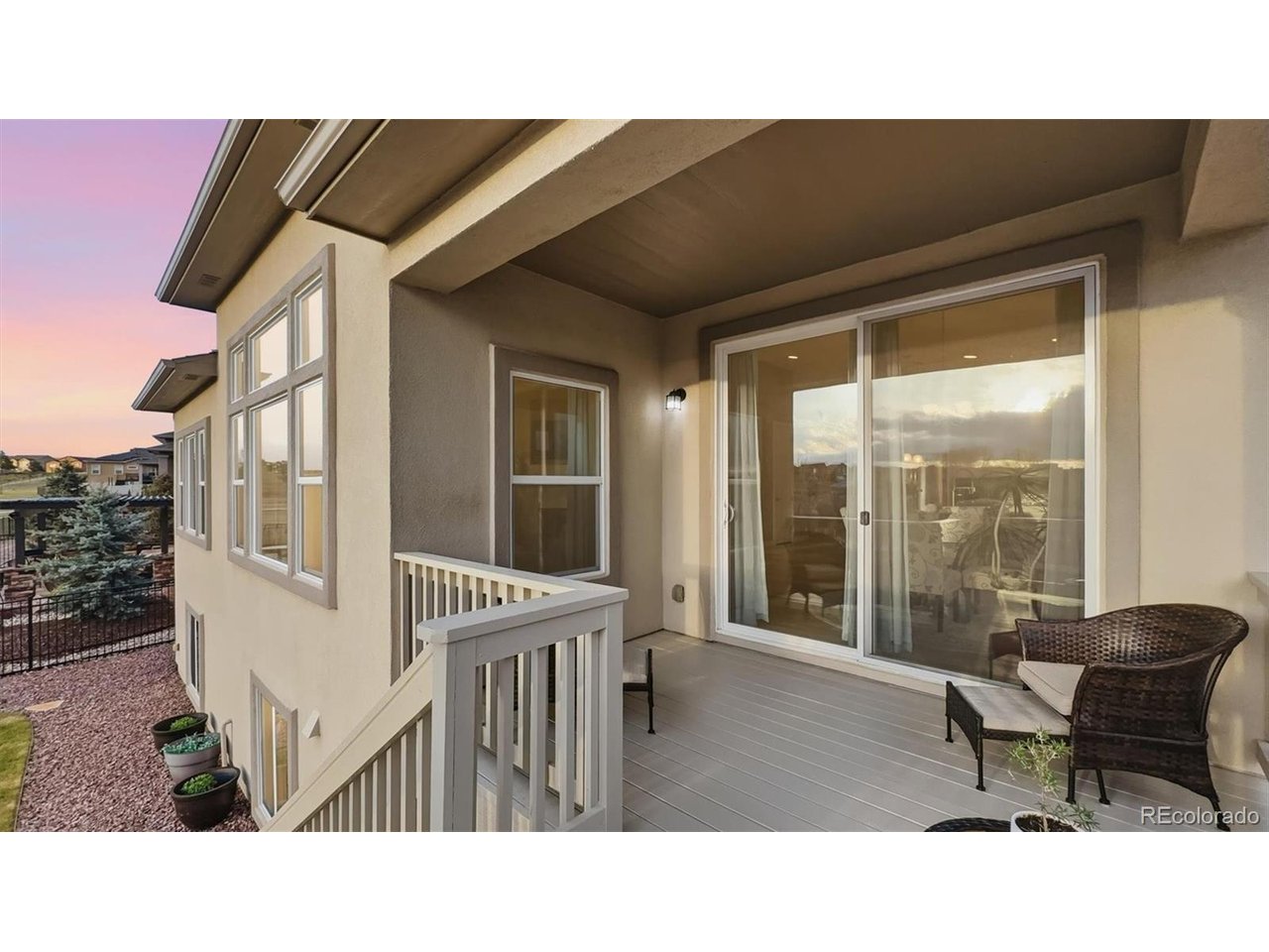 Covered deck located off the Dining Nook for outdoor dining and relaxation.