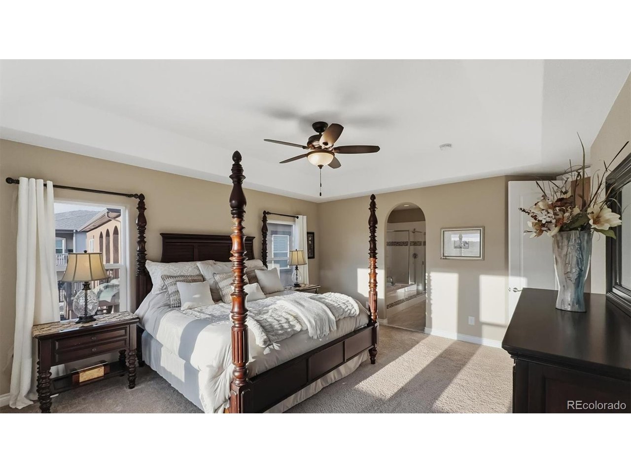 The main level Primary Bedroom is a private retreat with a walk in closet and adjoining luxurious 5pc Primary Bathroom.
