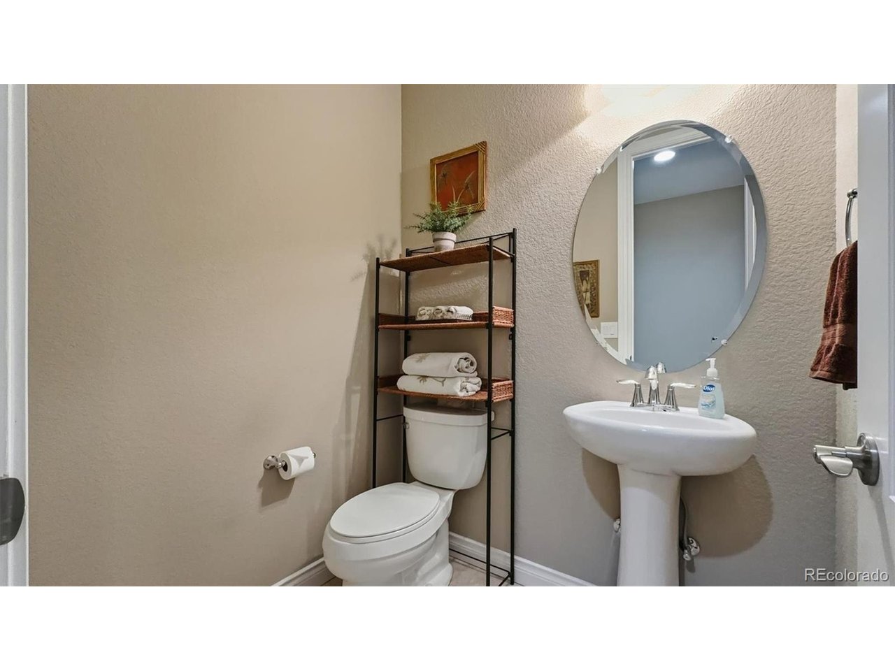 Convenient main level Powder Bathroom.