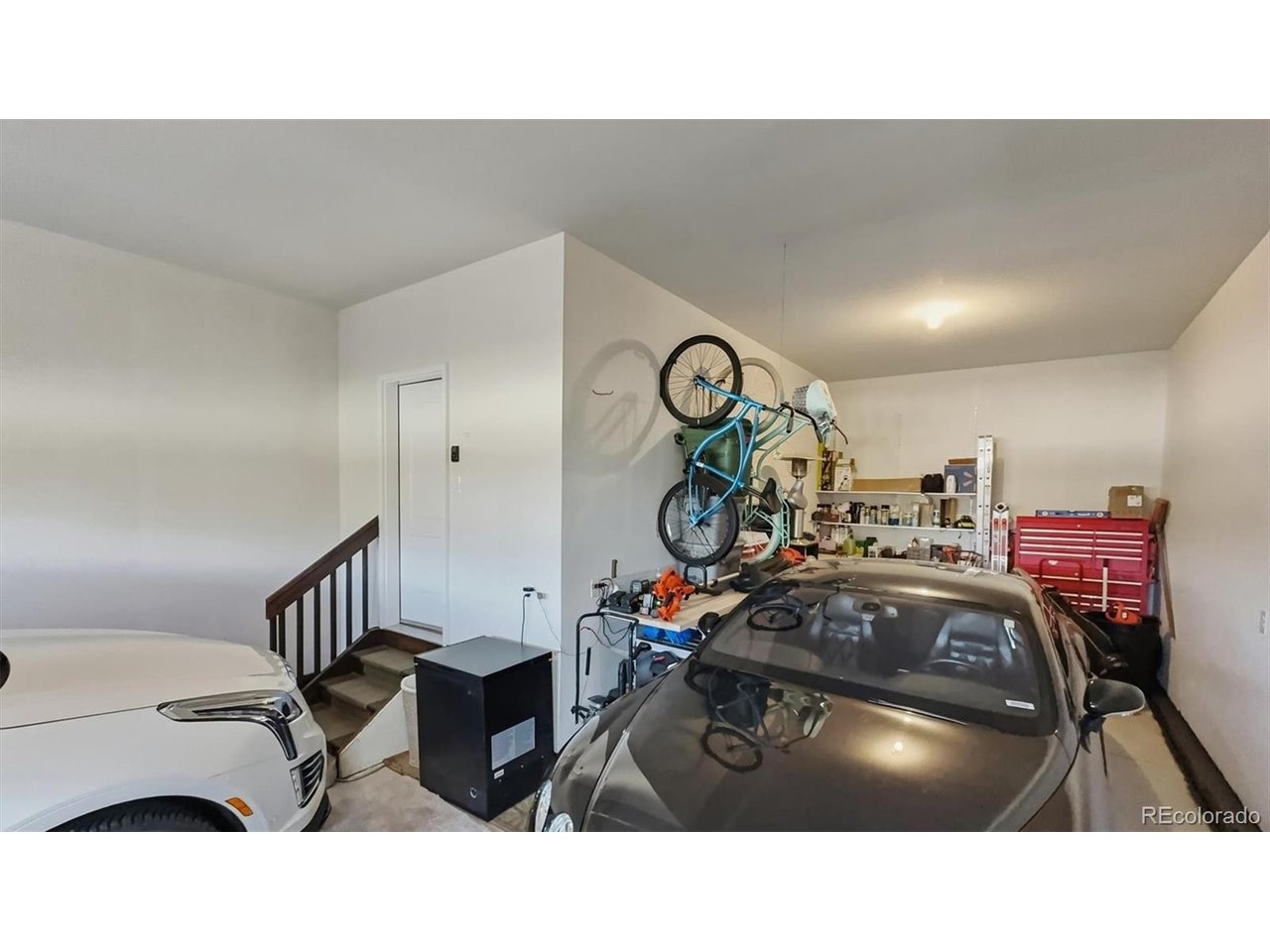 3-car attached tandem garage.