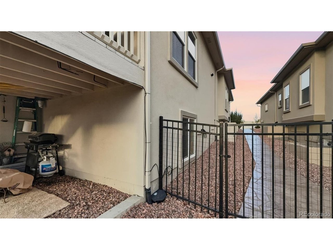 Side yard with flagstone walkway.