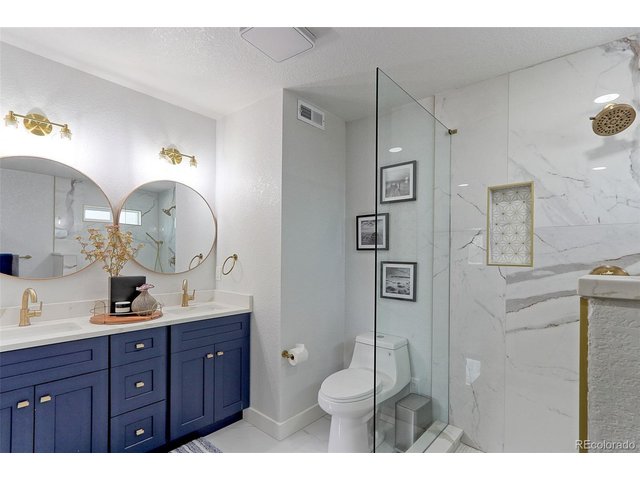 Property Photo 17 You will love getting ready for work in your incredible bathroom.