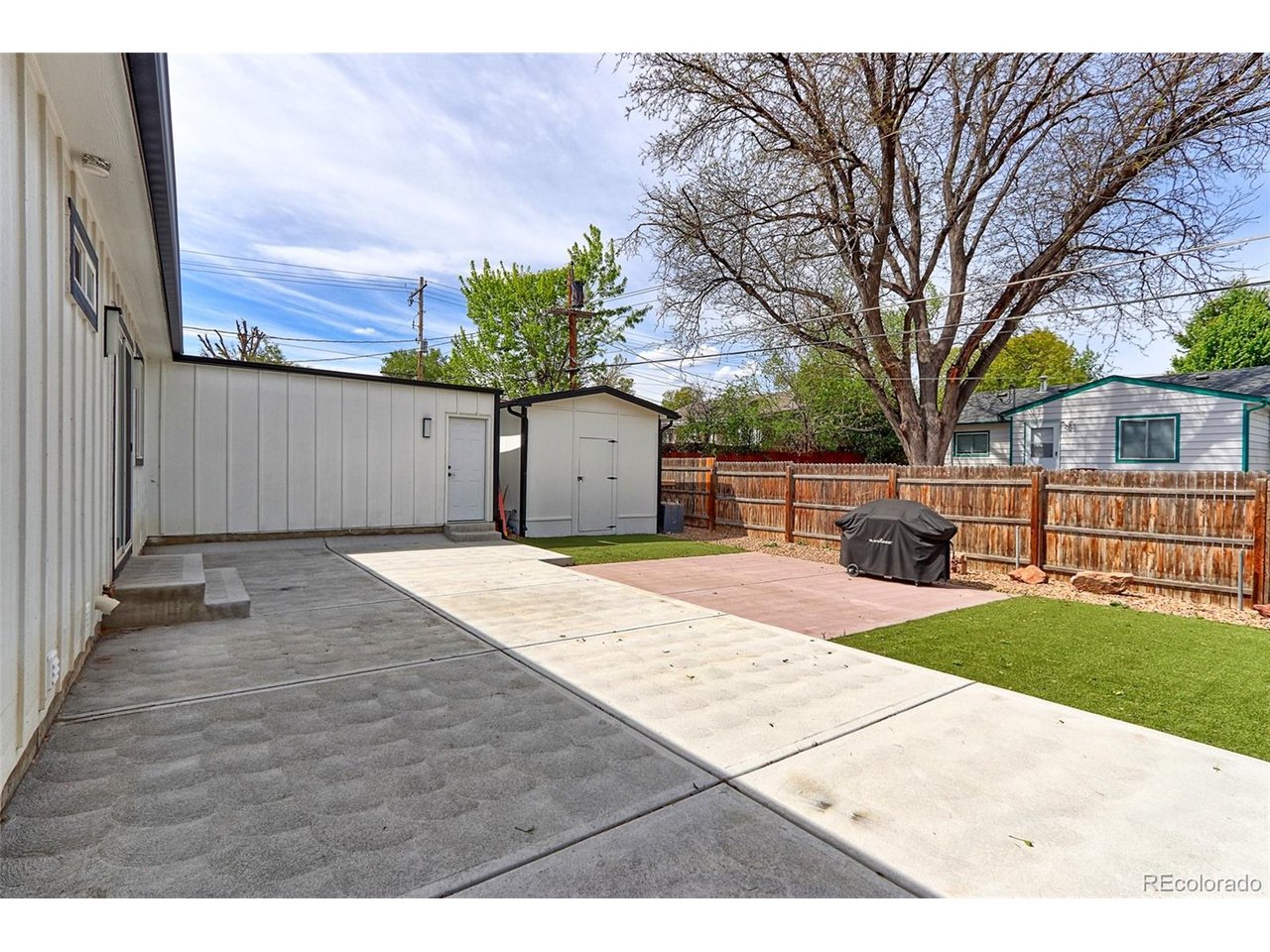 The fully fenced-in backyard is very private and spacious.
